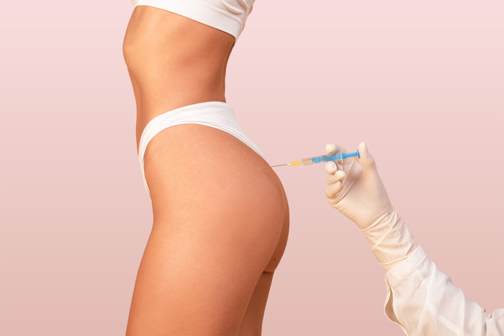 A side-profile shot of a woman receiving a butt injection, against a pink background.