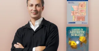 A headshot of Artemedica's Dr. Lacombe standing next to his two best-selling textbooks